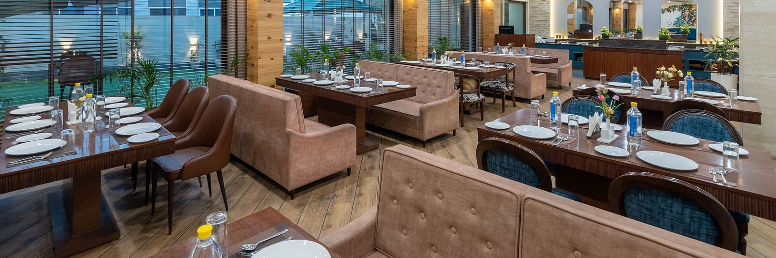 Dining area of a restaurant featuring air-conditioning and illuminating lights at DLS The Classio
